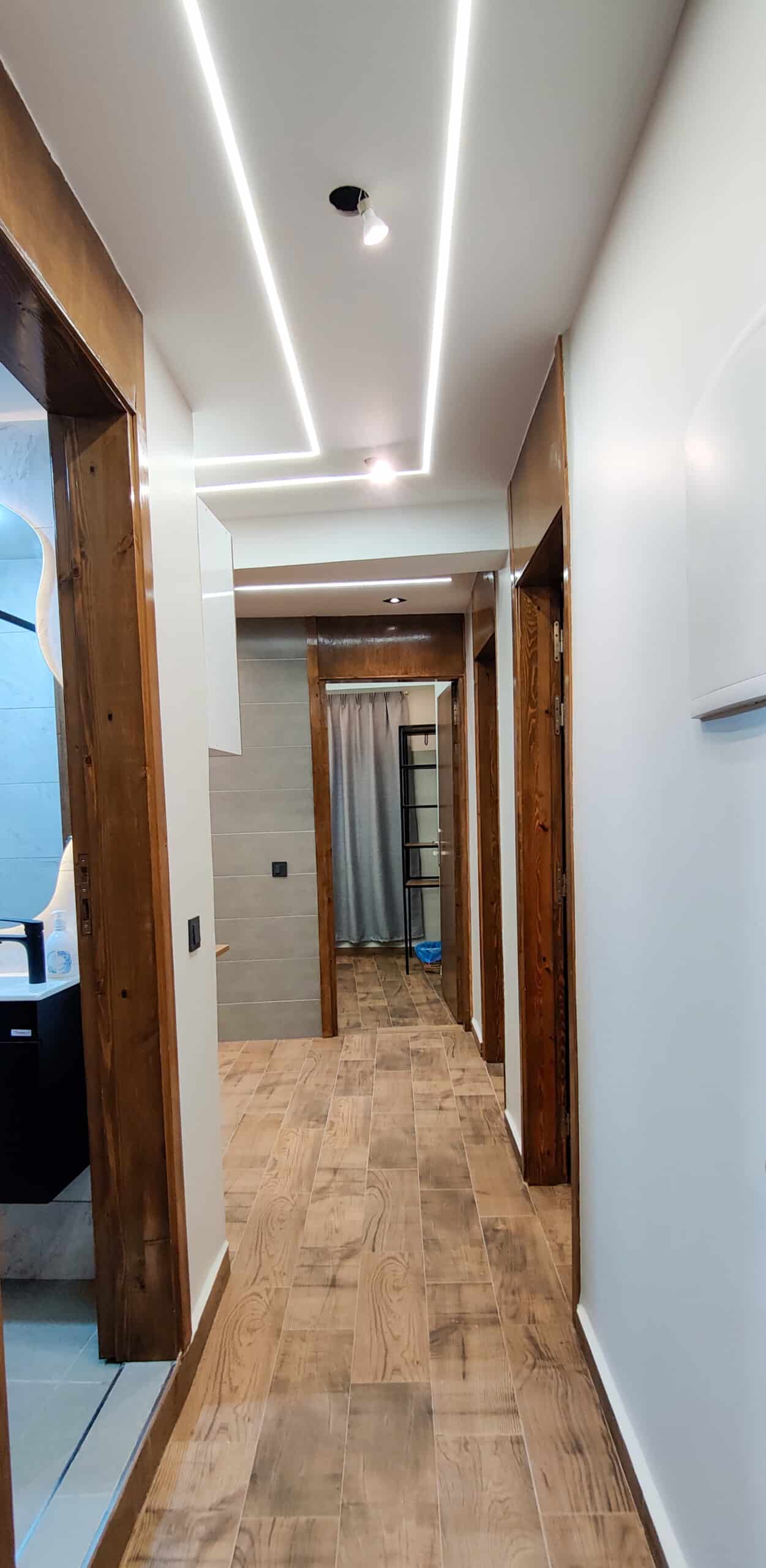 Bright hallway with LED lighting in Taghazout apartment