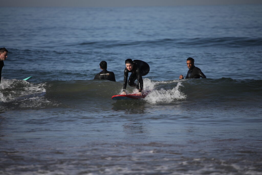 Surfing in Taghazout with locals taghazout surfcamp